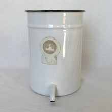 Load image into Gallery viewer, This vintage white and black enamel irrigator makes a perfect hanging container. Use as a planter, or to store garden tools. Has a hole on the back for hanging. Original Jones Ware label.
