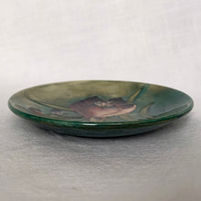 Load image into Gallery viewer, Vintage slip glazed and hand painted &quot;African Lily&#39; art pottery pin dish in tones of teal, green, burgundy and blue. Designed by Walter Moorcroft and produced by Moorcroft Pottery, England, circa 1950  In excellent condition, free from chips/cracks/repairs, crazing present. Impressed with &quot;Moorcroft&quot; and &quot;Made in England&quot;.  Measures 4-1/2&quot; x 3/4&quot;
