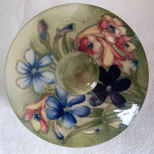 Load image into Gallery viewer, A gorgeous lidded trinket dish in the colourful &quot;Spring Flowers&quot; pattern, on green ground. Produced by Walter Moorcroft, Moorcroft Pottery, England, circa 1950s.  Size: 4-1/2&quot; x 3-1/4&quot;  In excellent condition, free from chips/cracks/repairs, with normal crazing for a piece of this age.  From our personal collection.
