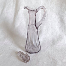 Load image into Gallery viewer, Elegant antique vinegar (dressing) pitcher with stopper. The glass has a slight purple tinge because the manganese in the glass turned violet in sunlight which makes it that much more beautiful.  In excellent condition, no chips or cracks.  Size 5.75&quot; x 3.25&quot;
