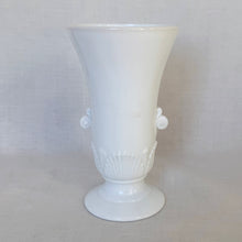 Load image into Gallery viewer, Beautifully detailed art deco style, opaque white glass vase. Pretty scroll handles and a scalloped shell motif in a tapered urn shape.  In excellent condition, free from chips or cracks. Marked &quot;Vitrock&quot; on the bottom.  Measures 4 1/4 x 7 3/4 inches
