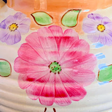 Load image into Gallery viewer, Hand painted art deco pitcher produced by Kensington Ware, England, circa 1940. Vibrant shades of pink, purple, green, yellow and orange against the creamy background with gold detail make this piece bright and cheery. Perfect as a display piece or as a vase filled with a beautiful bouquet of flowers. In excellent vintage condition, no chips with light crazing. There appears to be a crack on the interior, but it may just be crazing as it does not go through to the exterior. 
