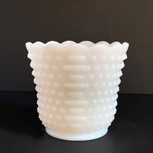 Load image into Gallery viewer, This simple and elegant vintage milk glass planter features the classic &quot;hobnail&quot; pattern with a lovely scalloped edge. Crafted by Anchor Hocking, USA, circa 1960s. This planter is the perfect vessel for greenery, flowering plants or even repurse as a pen or paintbrush holder. A classic for your cottage, farmhouse or wedding decor.  In excellent condition, no chips or cracks. Unmarked.  Measures 4 3/4 x 4 1/4 inches  We have 6 in stock, priced individually.  
