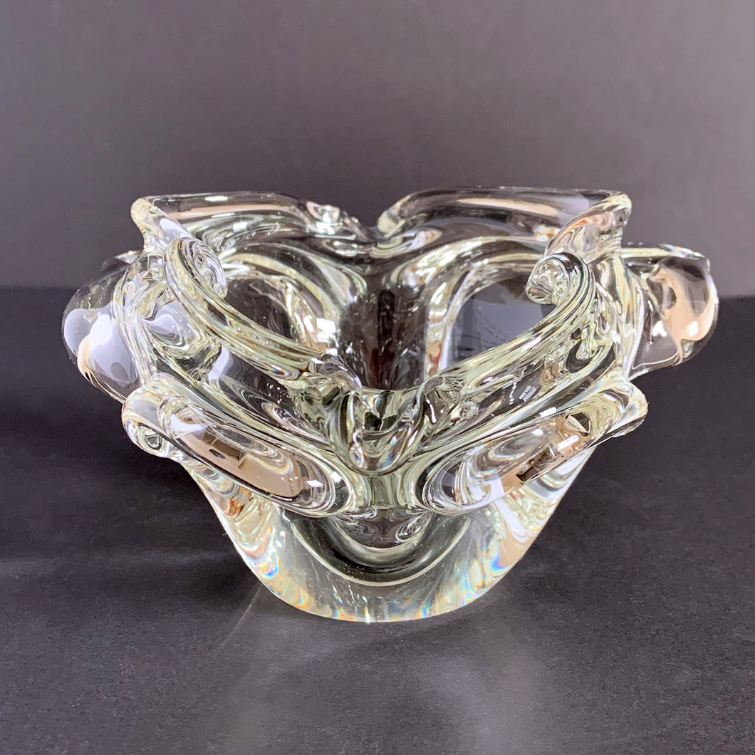 Elegant vintage crystal clear art glass ashtray or bowl. It is a beautifully hand sculpted piece. We are attributing this piece to Josef Michael Hospodka for the Chribska Glass. We don't see many Hospodka works in clear so this is a nice find!  In excellent condition, free from chips or cracks.  Measures 6 x 4 inches