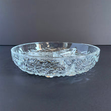 Load image into Gallery viewer, This glass relish dish reflects the light with such brilliance, you&#39;re going to need sunglasses to see all the daisy and button details! Produced by the Indiana Glass Company, USA, circa 1940s.  In excellent condition, no chips or cracks.  Measures 7 1/2 x 1 1/2 inches
