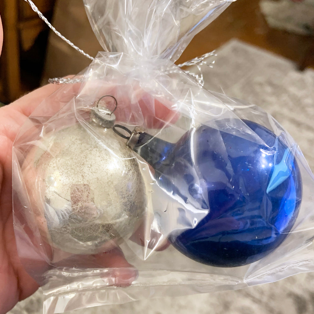 Classic hand blown vintage glass ball Christmas tree ornaments in blue and silver with great patina.  In vintage condition.  Each measures 2