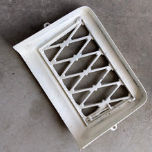 Load image into Gallery viewer, This antique heating vent register cover has been painted a creamy white. Use as intended, or flip it upside down and attach it to the wall for a unique mail, magazine or newspaper holder.
